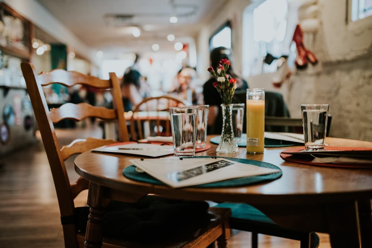 Cocktails and shared plates on a softly lit Chicago restaurant table