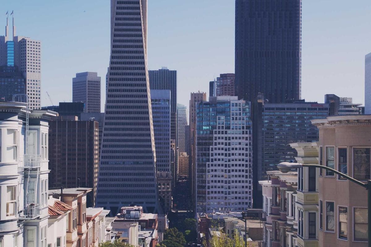 An upscale dining room with moody lighting and elegant table settings in Washington D.C.