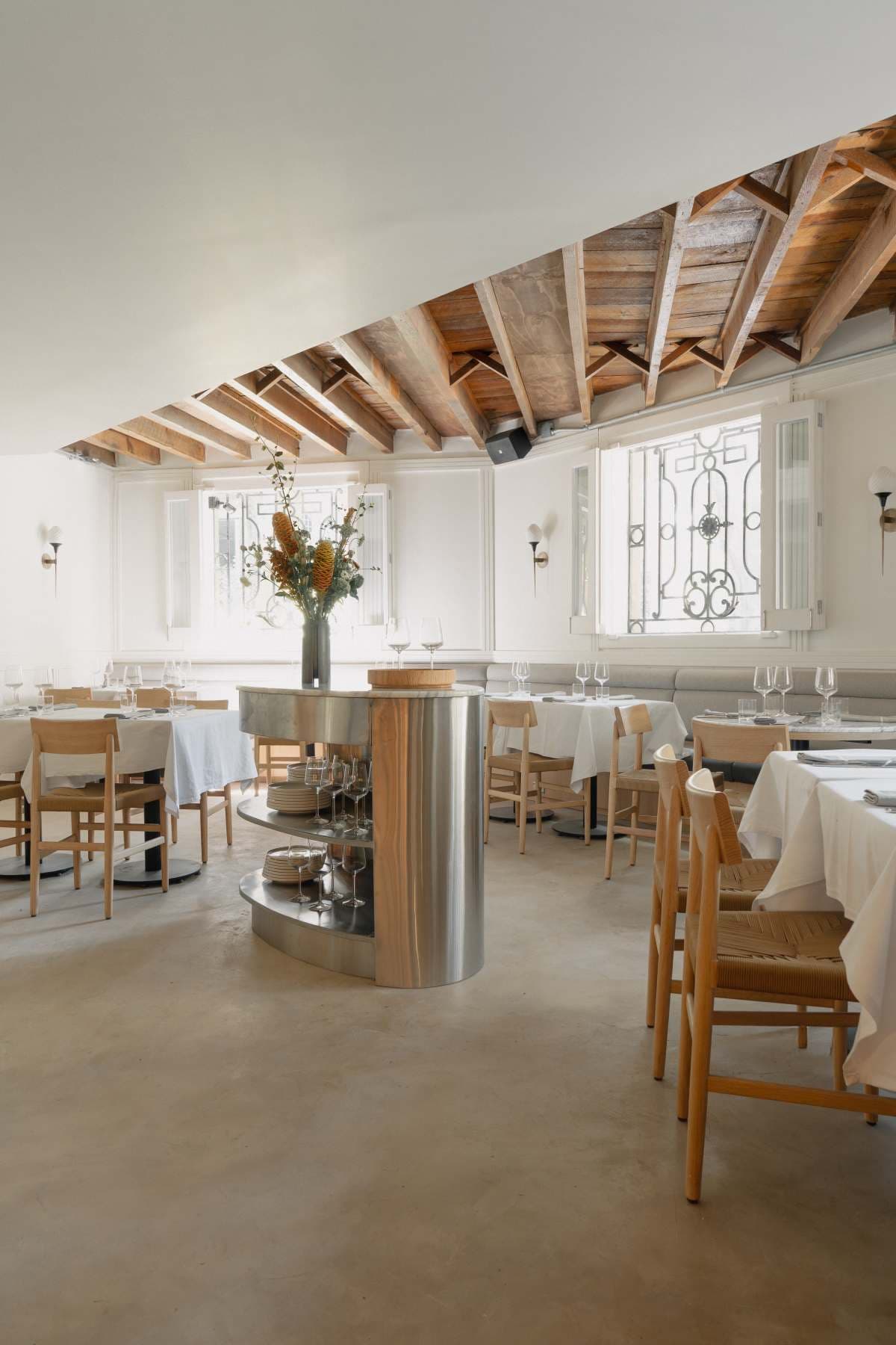 Intimate candlelit restaurant table in a stylish small dining room
