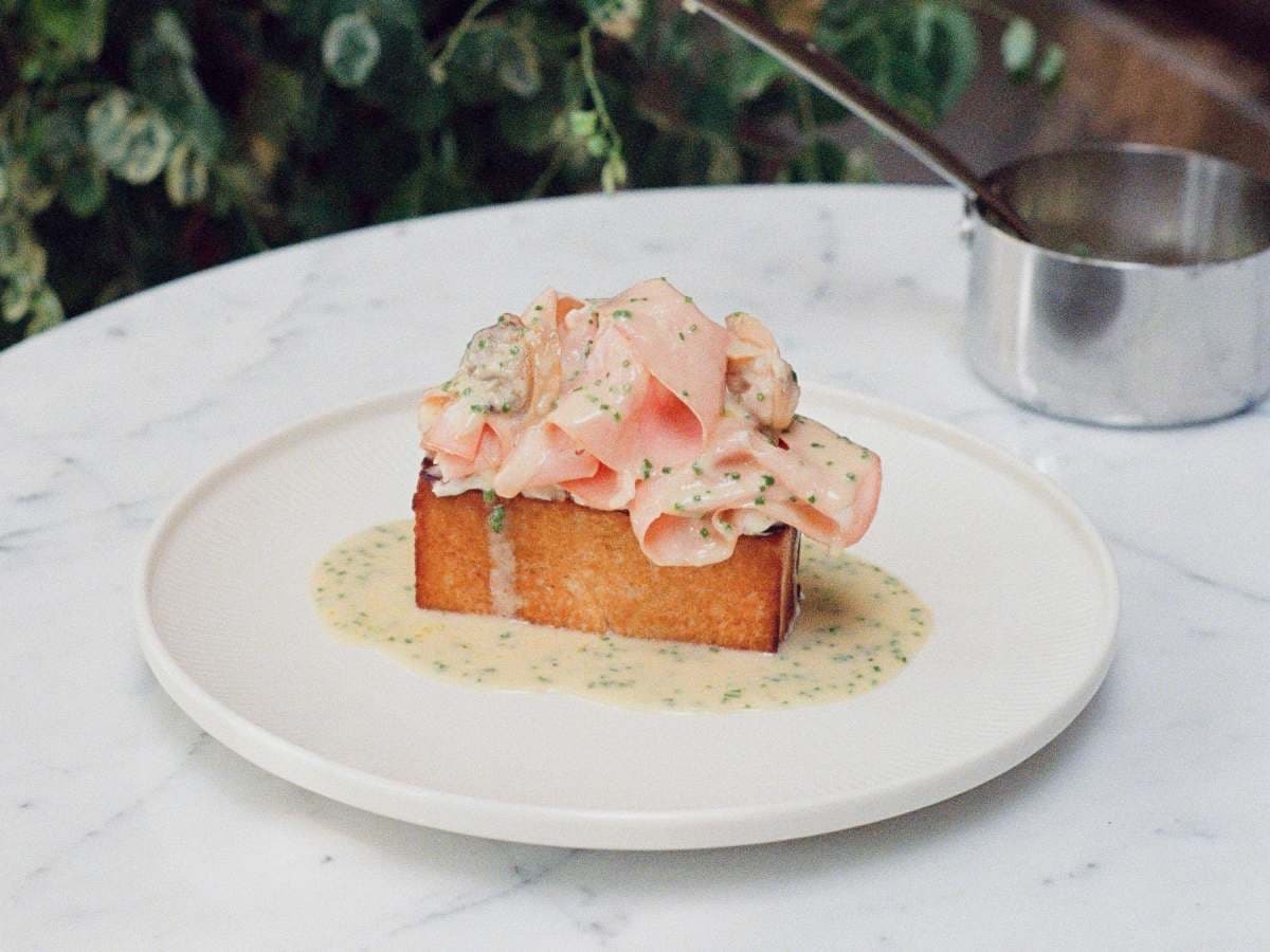 Warm Mexico City dining room with glowing lights and a stylish dinner service