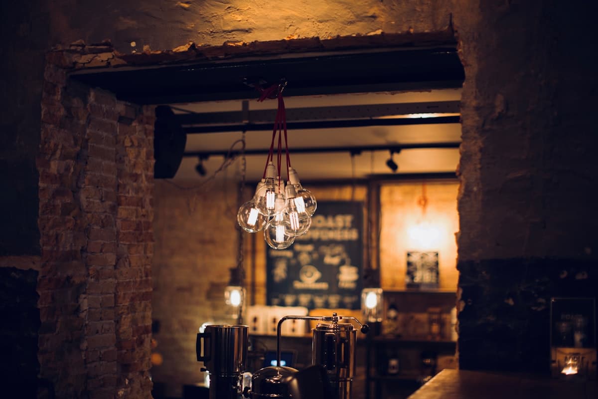 Cozy pasta restaurant interior with warm lighting and intimate tables