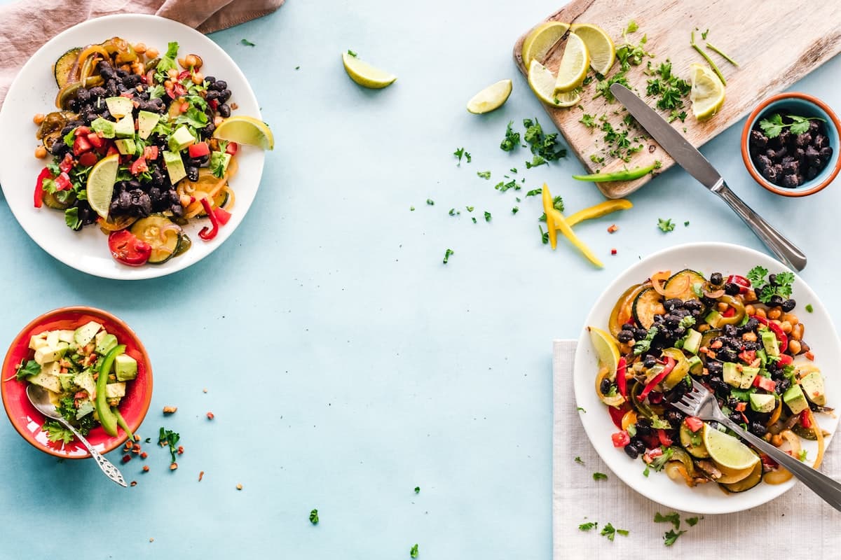 Colorful Mediterranean meze dishes arranged across a restaurant table